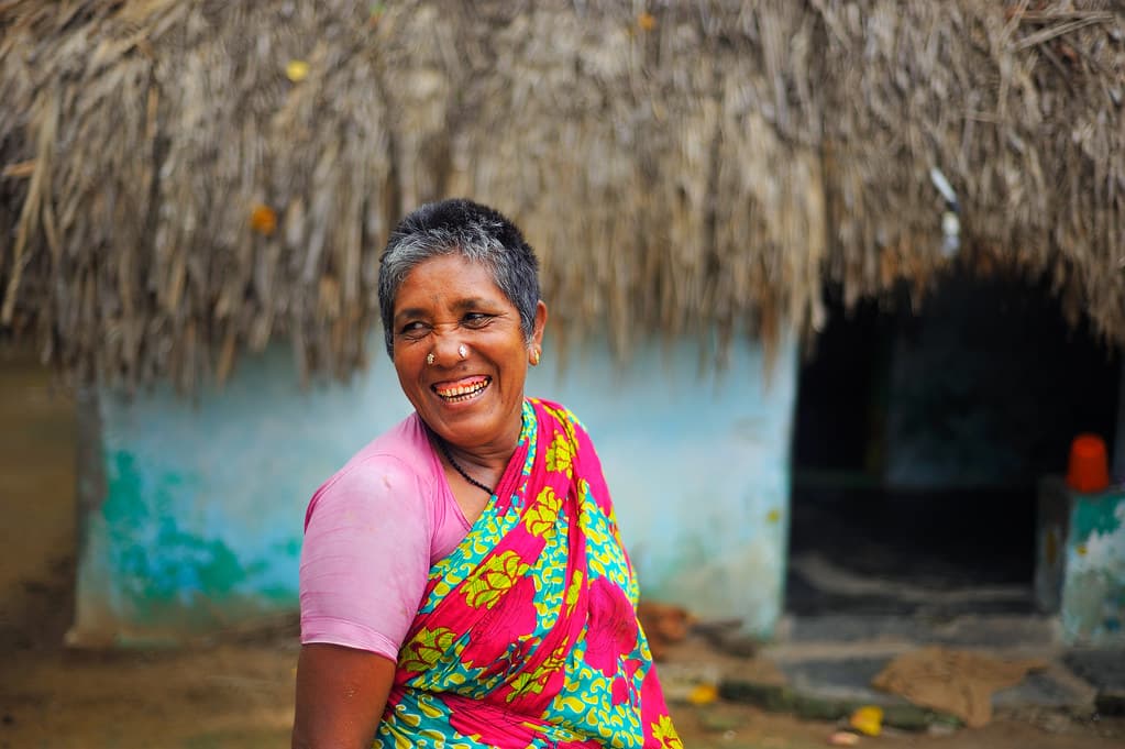 Smiling child supported by foundation programs